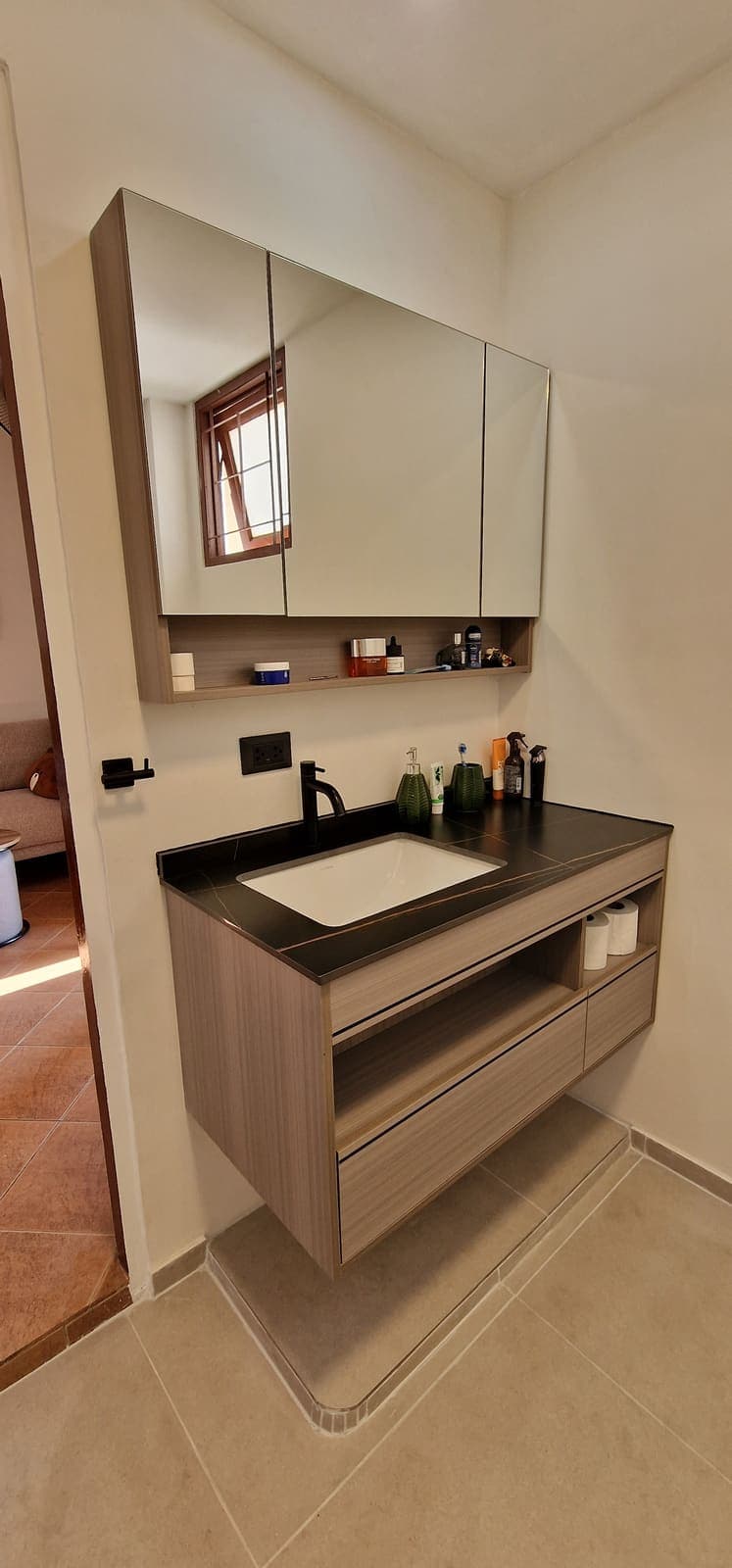 Bathroom vanity with mirrored cabinet and generous storage