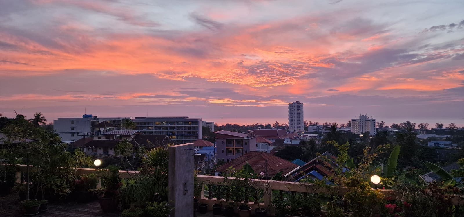 Sunset over the Karon skyline and the Andaman Sea